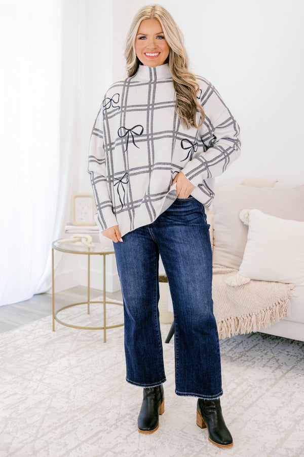 Chic Soul plus size clothing, white and grey grid pattern long sleeve sweater with mock neck and black bow print 