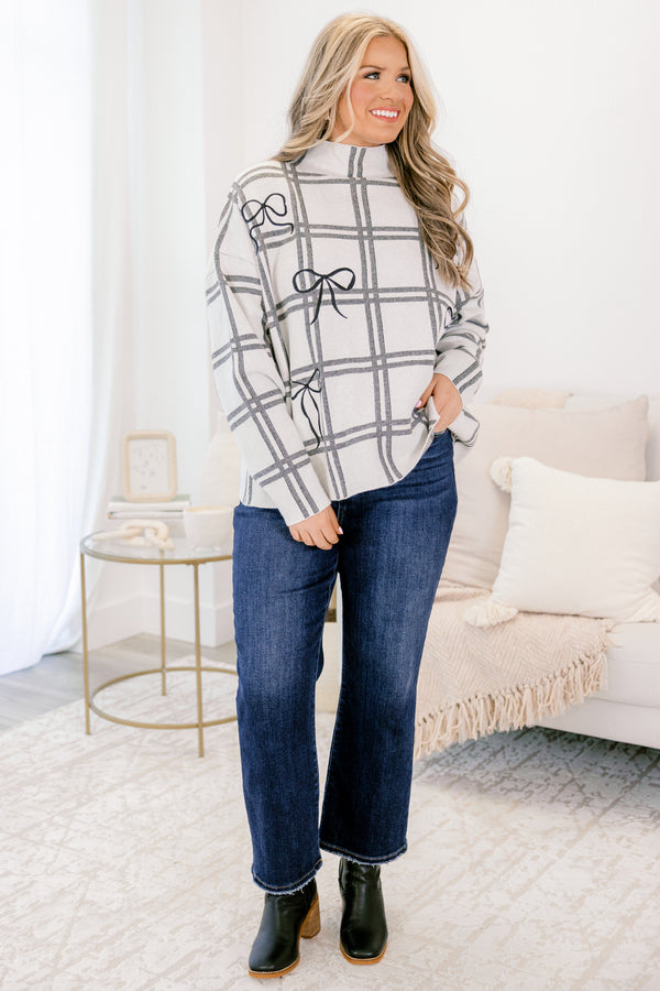 Chic Soul plus size clothing, white and grey grid pattern long sleeve sweater with mock neck and black bow print 