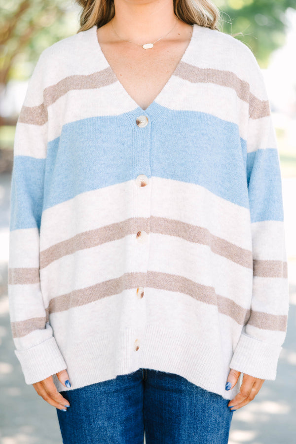 Plus Size oversized v-neck cardigan with brown and blue horizontal stripes and button-down front.