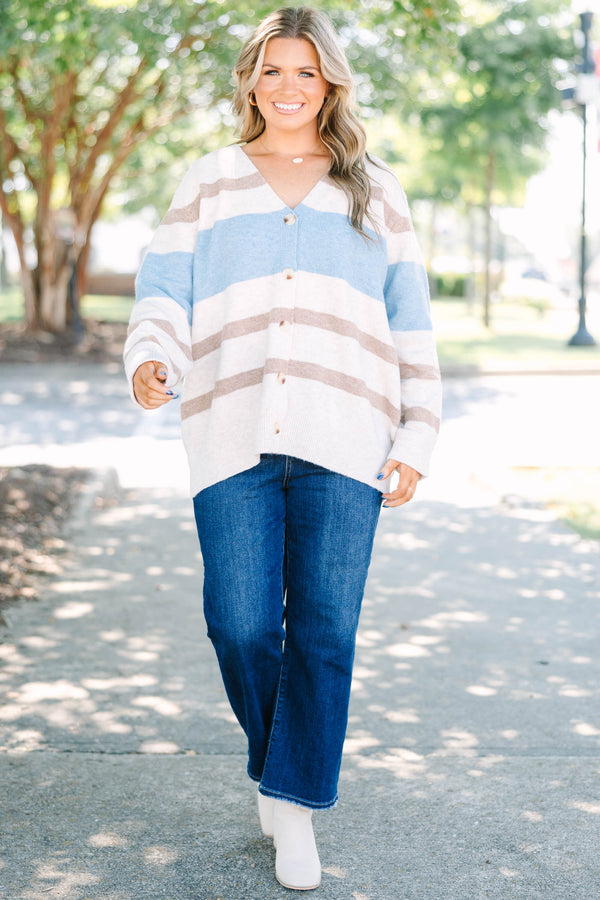 Plus Size oversized v-neck cardigan with brown and blue horizontal stripes and button-down front.