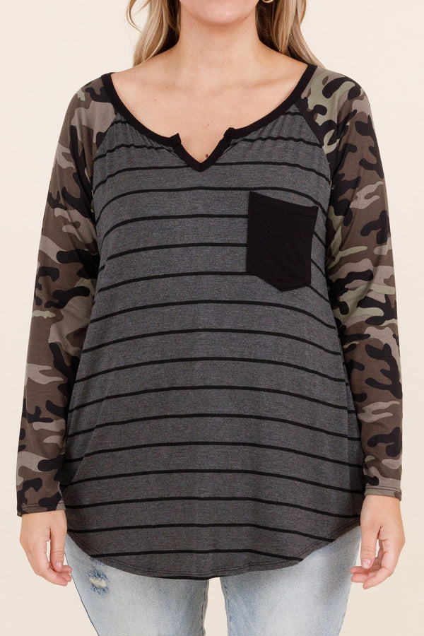 Chic Soul plus size clothing, olive colored top with grey and black stripes and faux camo sleeves and small pocket on left side of the chest and micro v neck detailing
