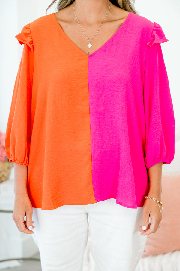 Chic Soul plus size clothing, orange-fuchsia split long sleeve top with v neckline and ruffle on shoulders with cuff sleeves