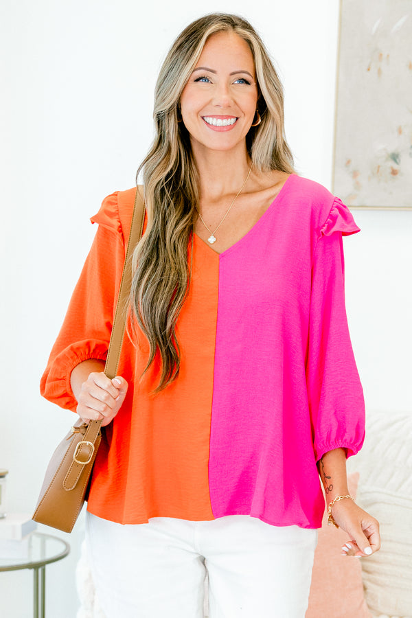 Chic Soul plus size clothing, orange-fuchsia split long sleeve top with v neckline and ruffle on shoulders with cuff sleeves