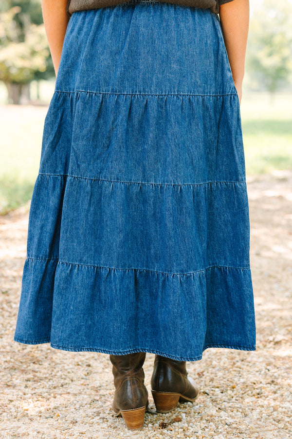 Plus size dark wash denim tiered maxi skirt with a comfortable elastic waist and flowy silhouette.