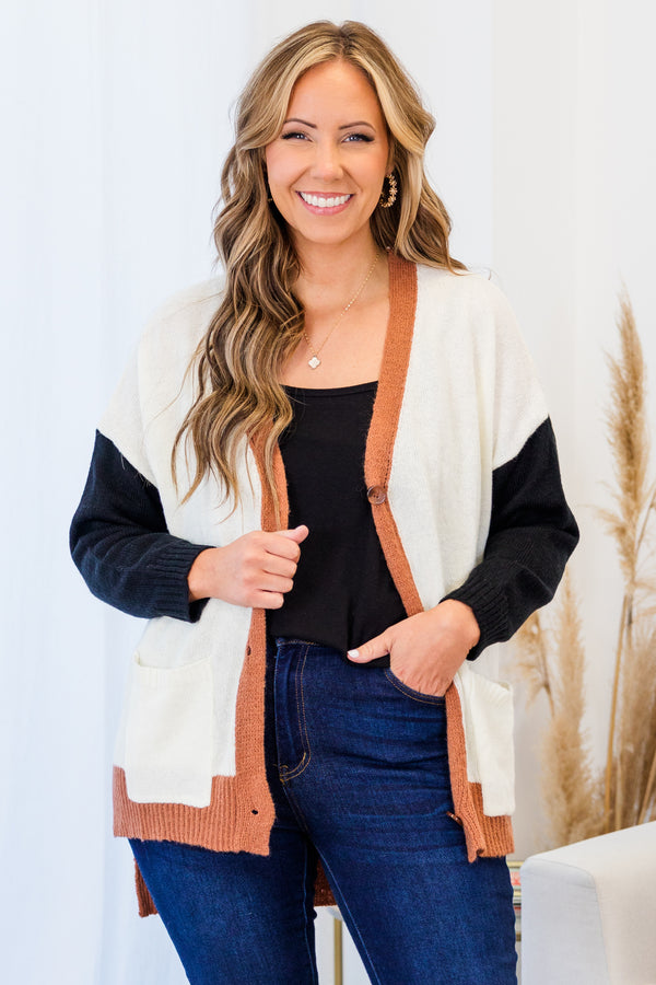 Chic Soul plus size clothing, long-sleeve white cardigan outlined with orange rust with black sleeves with orange rust button detailing 