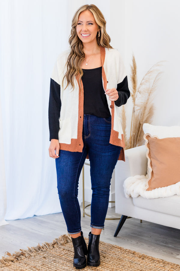 Chic Soul plus size clothing, long-sleeve white cardigan outlined with orange rust with black sleeves with orange rust button detailing 