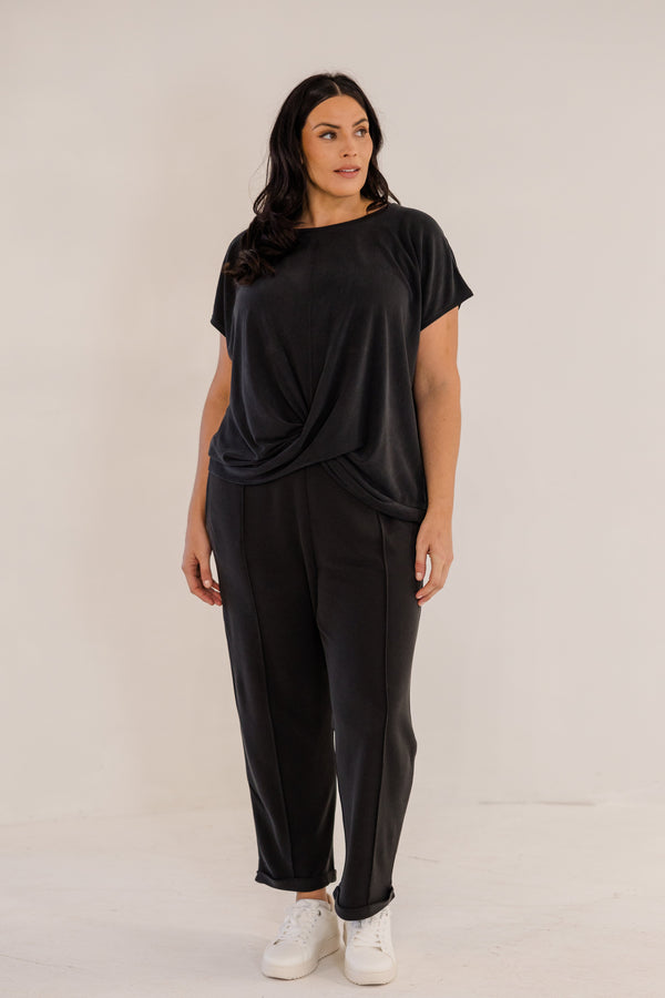Chic Soul plus size clothing, black short sleeve flowy top with cross front detail with round neckline