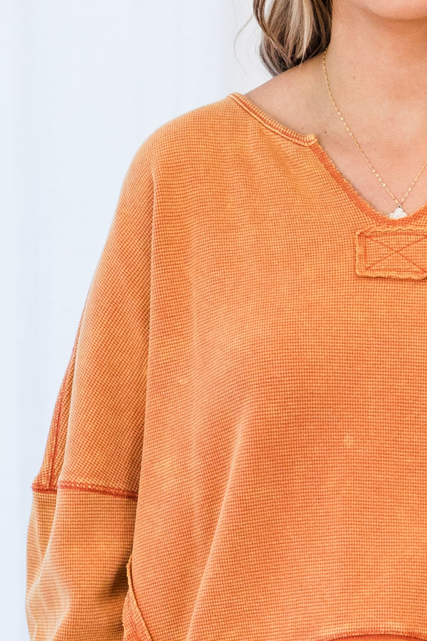 Chic Soul plus size clothing, orange long sleeve pullover with v neckline and cuff sleeves with band across bottom