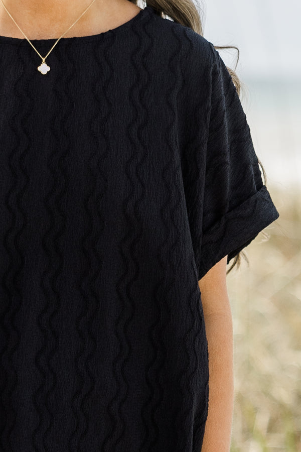 Chic Soul plus size clothing, black short sleeve top with cuffs at the end of the sleeves 
