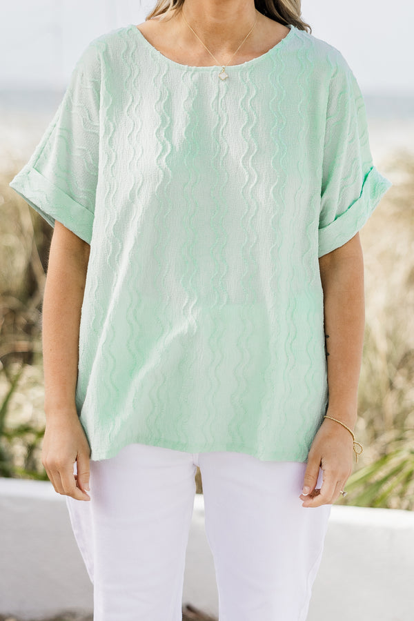 Chic Soul plus size clothing, mint green top with subtle vertical wavy line texture and rolled hem short sleeves