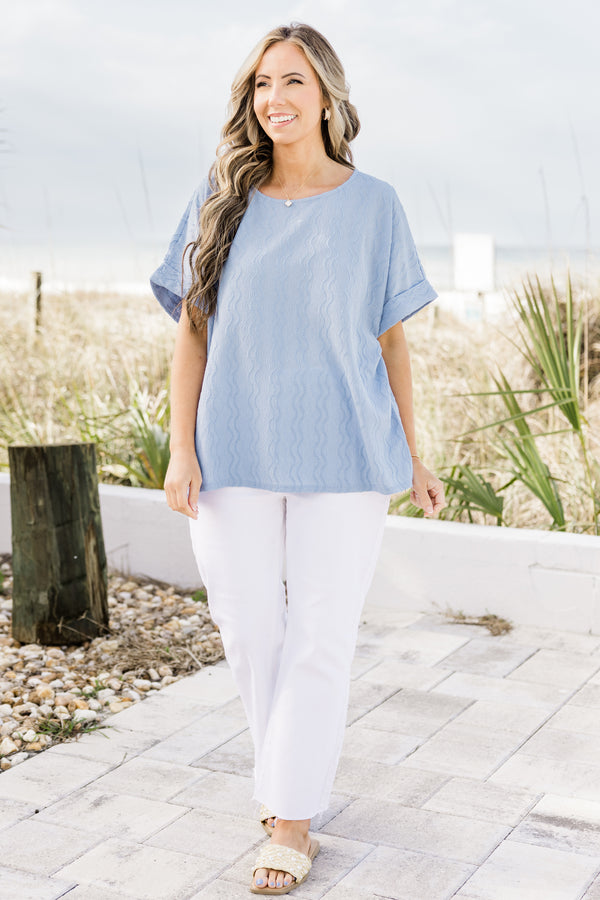 Plus Size sky blue ripple textured top with a round neckline and cuffed short sleeves.
