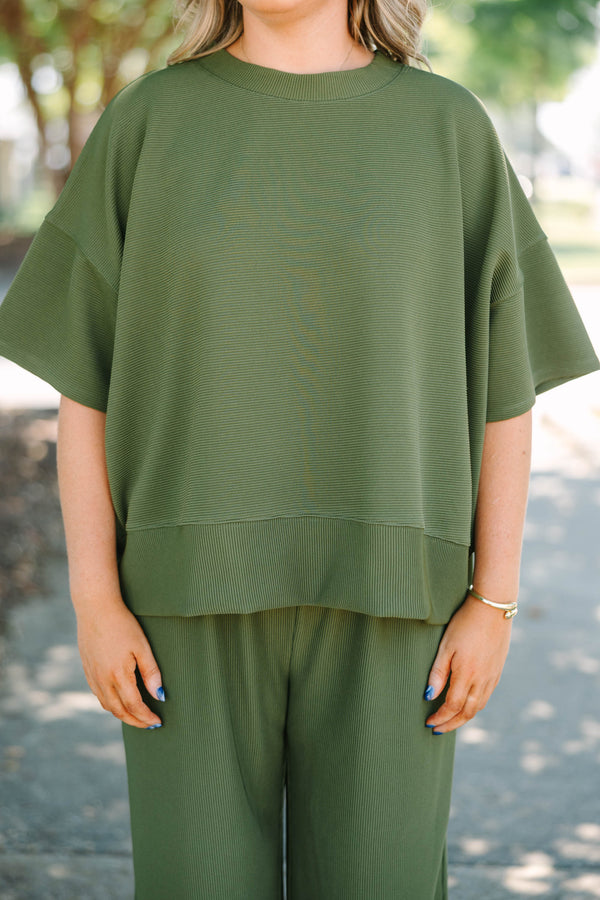 Plus Size olive green ribbed knit set featuring a short sleeve crewneck top and wide-leg pants.