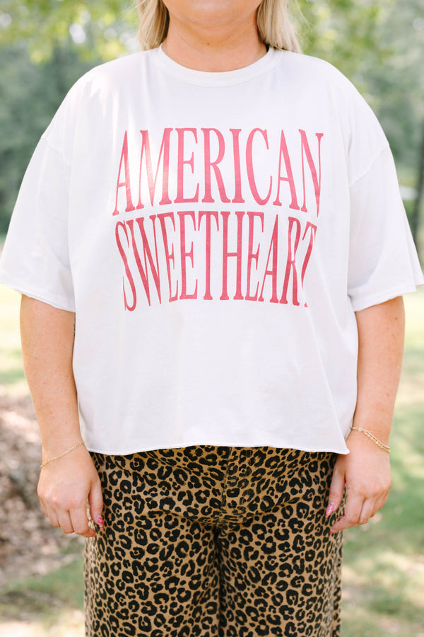 Plus Size white vintage wash tee with red American Sweetheart text and leopard print pants.