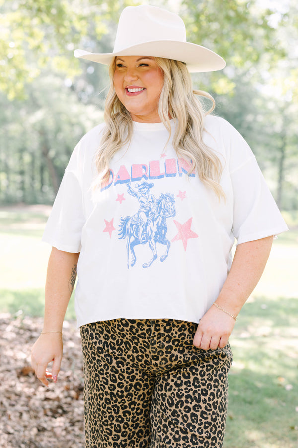 Plus Size white vintage wash graphic tee with a cowboy design and leopard print pants.