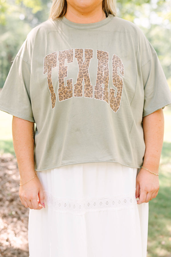 Plus Size army green vintage wash tee with leopard print TEXAS graphic and white lace trim skirt.