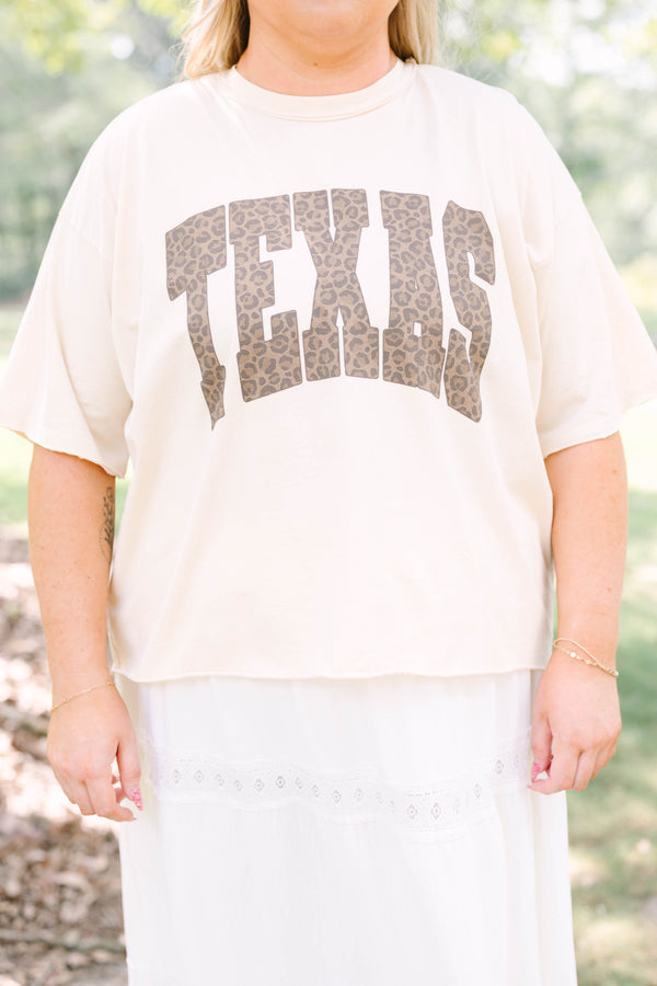 Plus Size sand vintage wash tee with leopard print Texas graphic and white tiered lace skirt.