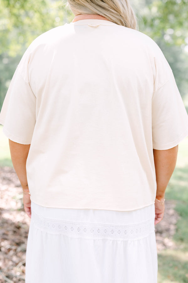 Plus Size sand vintage wash tee with leopard print Texas graphic and white tiered lace skirt.