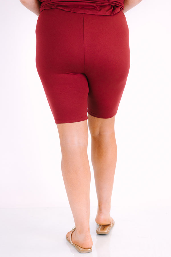 Plus Size cabernet two-piece set featuring a V-neck short sleeve tunic top and matching bike shorts.