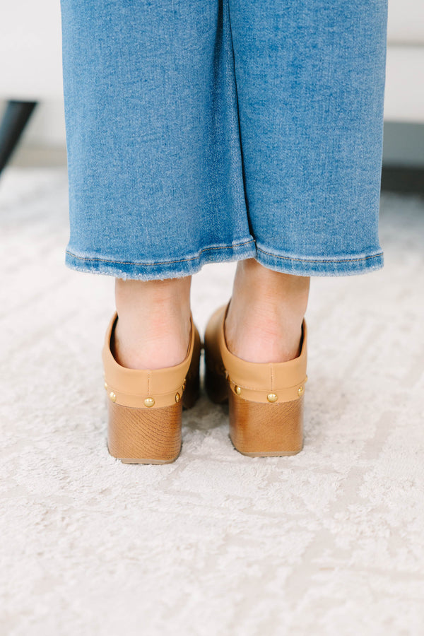 Plus Size apricot clogs with a wooden platform heel, gold stud details, and blue denim jeans.