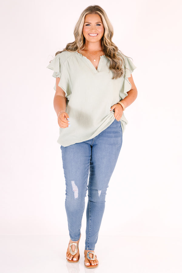 Chic Soul plus size clothing, medium wash skinny jeans with distressing at the knees