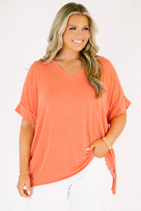 Plus Size deep coral v-neck top with a relaxed fit, short cuffed sleeves, and soft fabric.