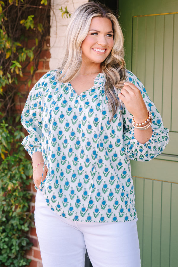 Chic Soul plus size clothing, white top with half bubble sleeves  slight v-neckline and a blue and green floral block pattern throughout