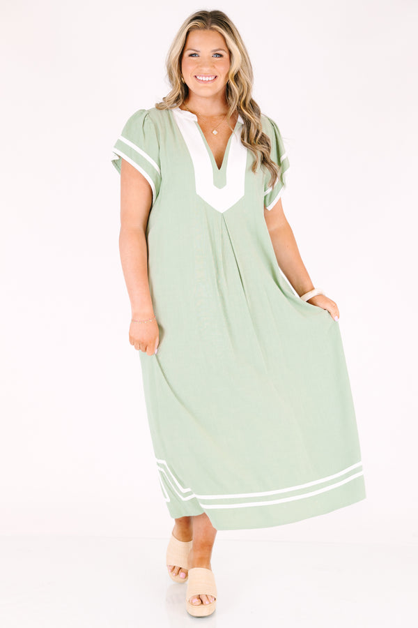 Chic Soul plus size clothing, sage maxi dress with white line designs outlining the bottom of the dress the end of the sleeves an a thick white strip outlining the v-neckline
