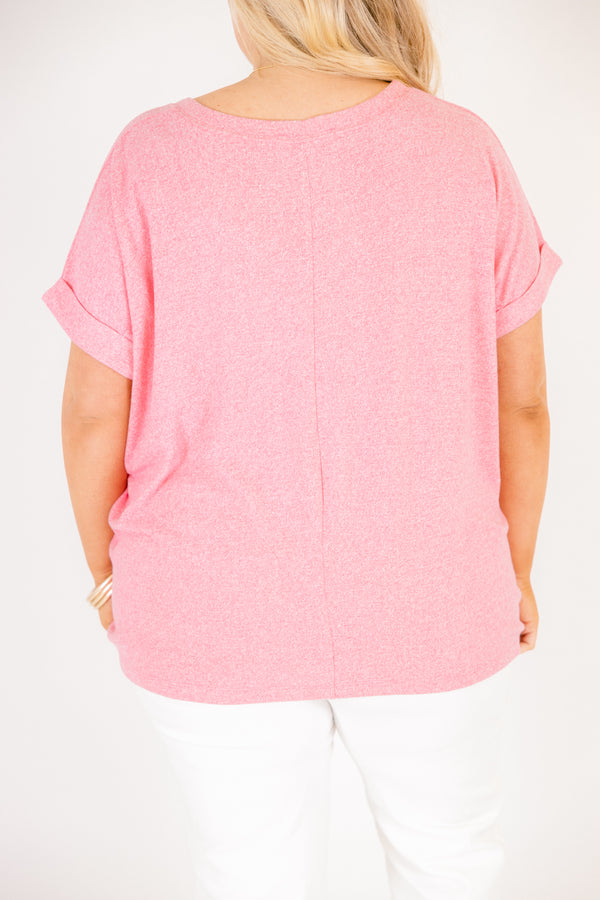Plus Size heather kelly green crew neck cotton tee with cuffed short sleeves and white pants.