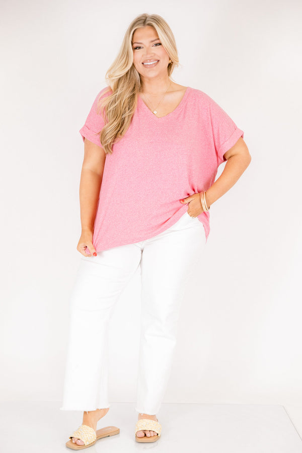 Plus Size heather kelly green crew neck cotton tee with cuffed short sleeves and white pants.