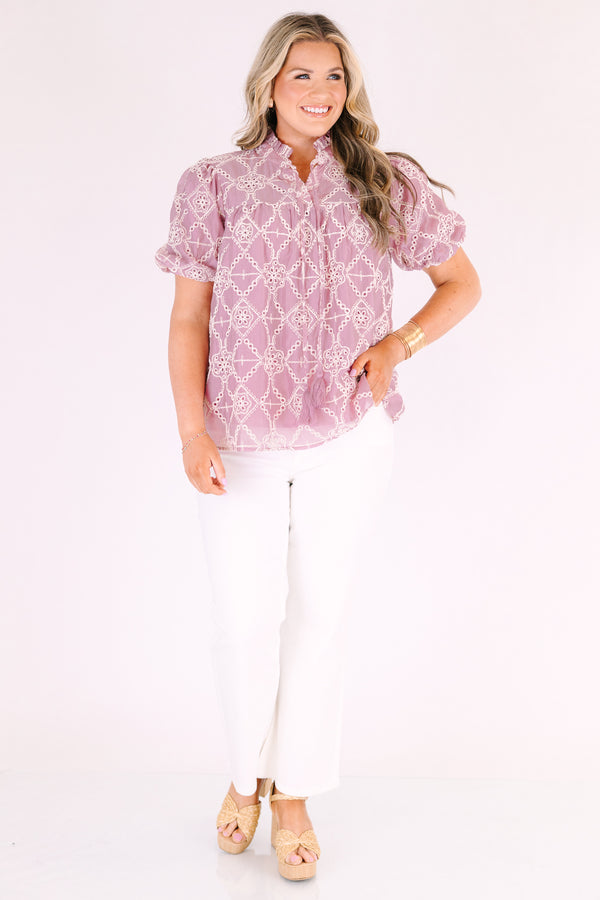 Chic Soul plus size clothing, mauve  short-sleeve blouse with a relaxed, flowy fit, featuring eyelet geometric patterns and a ruffled split neckline with tie tassels
