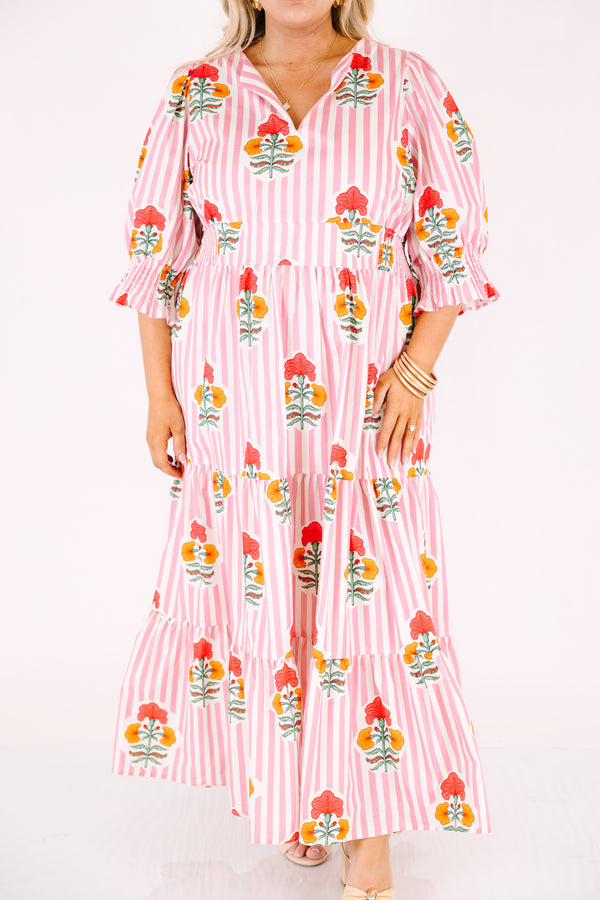 Chic Soul plus size clothing, orange striped maxi dress with half sleeves that have a ruffle flare out on the ends as well as a slight v-neckline and a floral block pattern throughout 