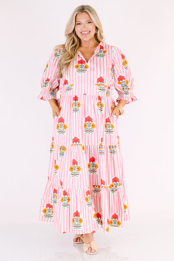 Chic Soul plus size clothing, orange striped maxi dress with half sleeves that have a ruffle flare out on the ends as well as a slight v-neckline and a floral block pattern throughout 