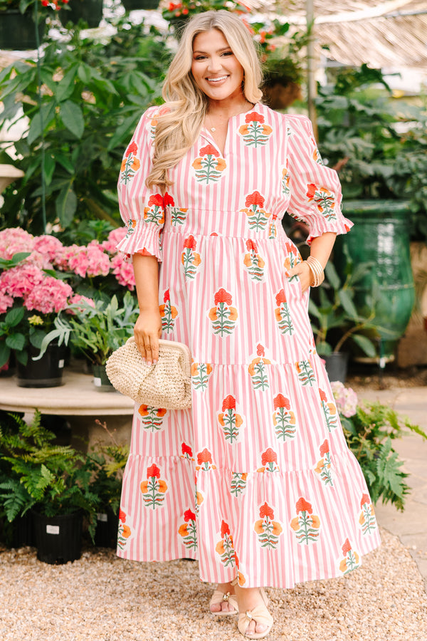 Chic Soul plus size clothing, orange striped maxi dress with half sleeves that have a ruffle flare out on the ends as well as a slight v-neckline and a floral block pattern throughout 