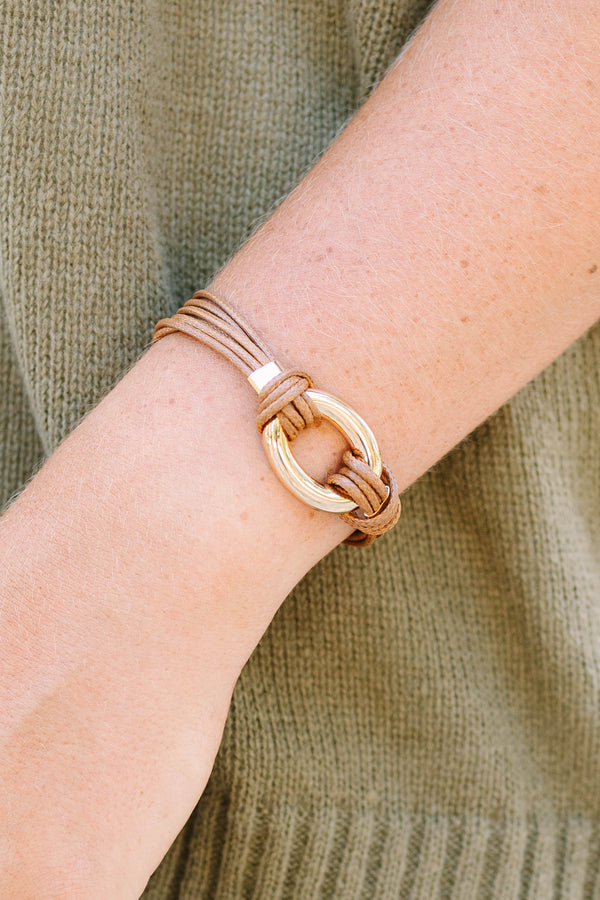 Desert Darling Bracelet in brown featuring multi-strand cord and a gold oval ring clasp.