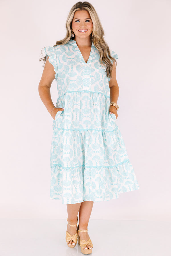 Chic Soul plus size clothing, white tiered midi dress with flutter sleeves a slight v-neckline and a turquoise abstract fan pattern throughout 

