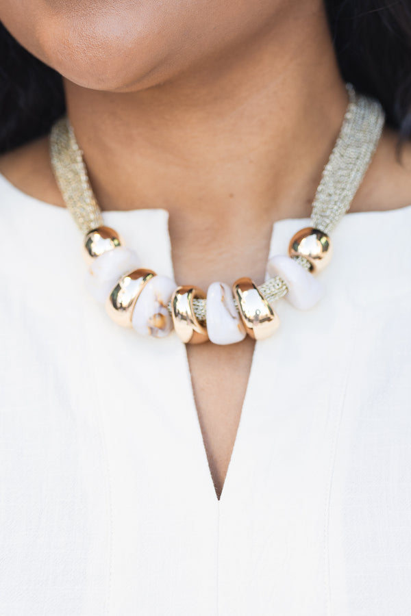 Chic Soul plus size clothing, gold necklace with gold and white marble beads attached to necklace 