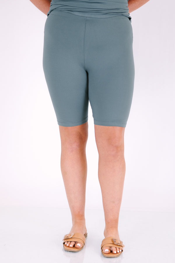 Plus Size ash jade short set with a round neck, high-low hem top and matching biker shorts.