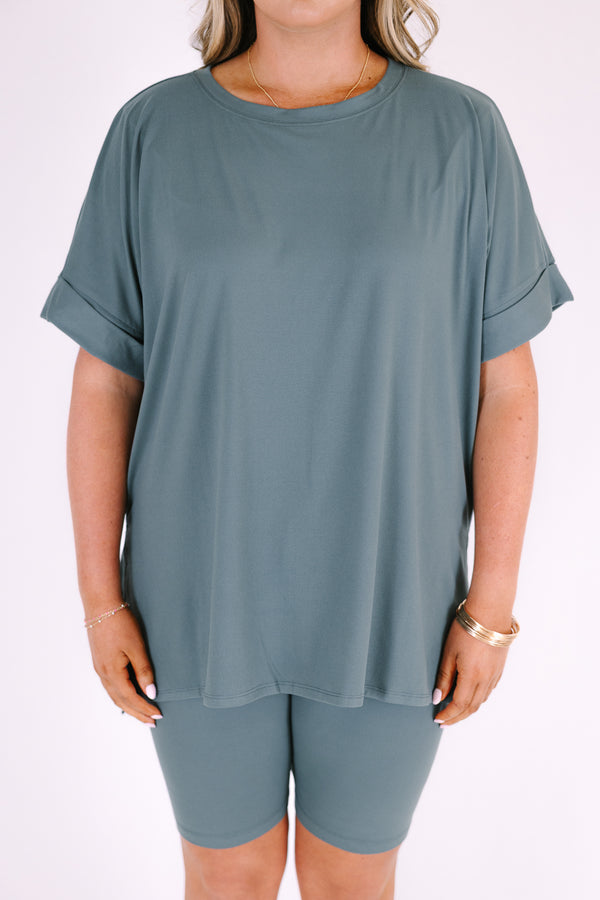 Plus Size ash jade short set with a round neck, high-low hem top and matching biker shorts.