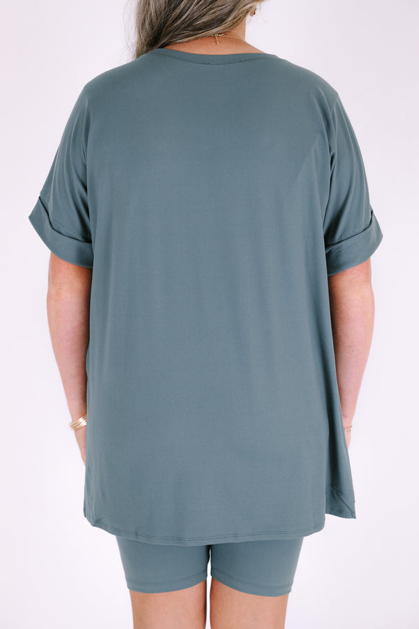 Plus Size ash jade short set with a round neck, high-low hem top and matching biker shorts.