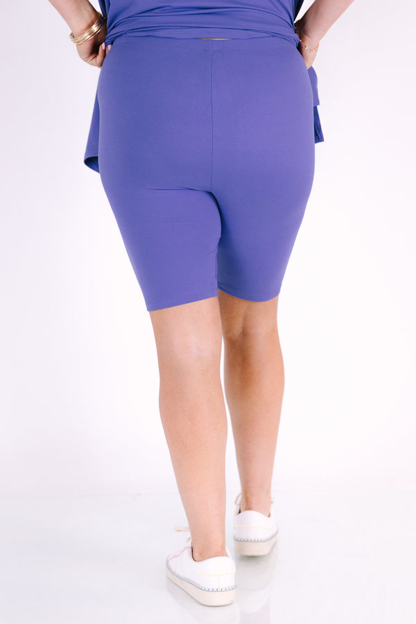 Plus Size marlin blue short set with a round neck high-low top and matching biker shorts.