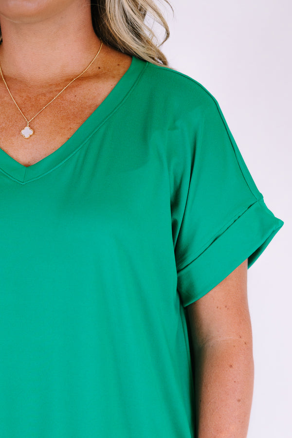 Plus Size kelly green v-neck dress with rolled short sleeves and side pockets.
