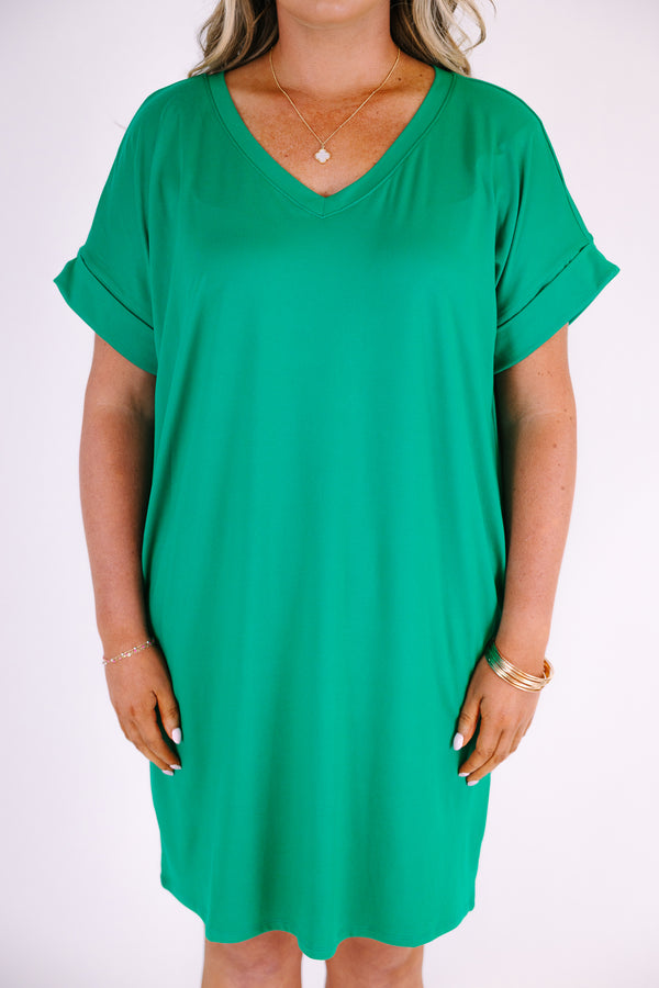 Plus Size kelly green v-neck dress with rolled short sleeves and side pockets.