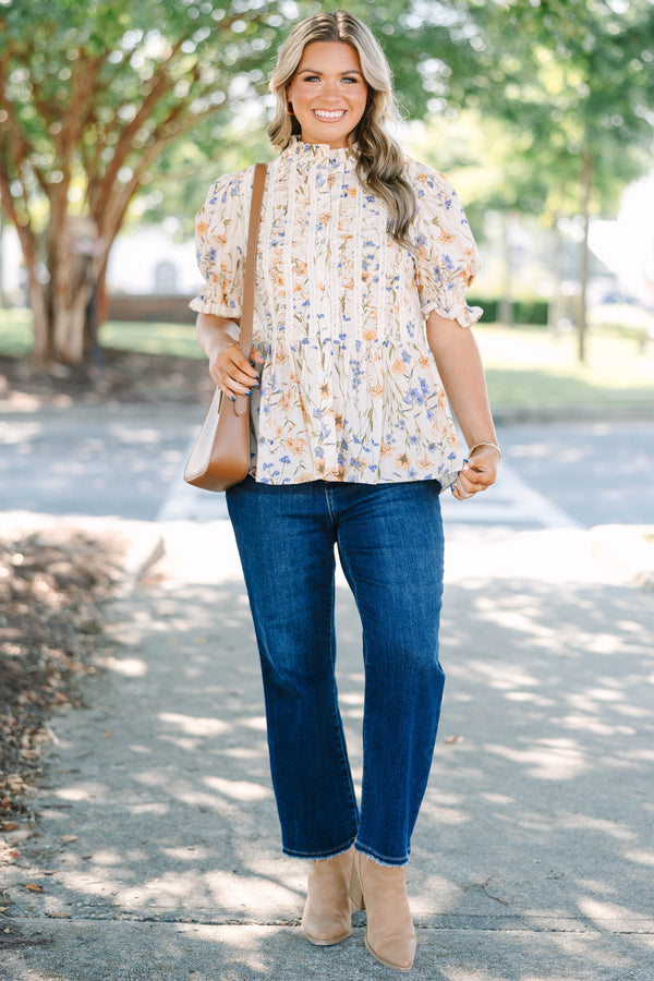Plus Size cream floral top with puff sleeves, lace trim, and a high ruffled neckline.
