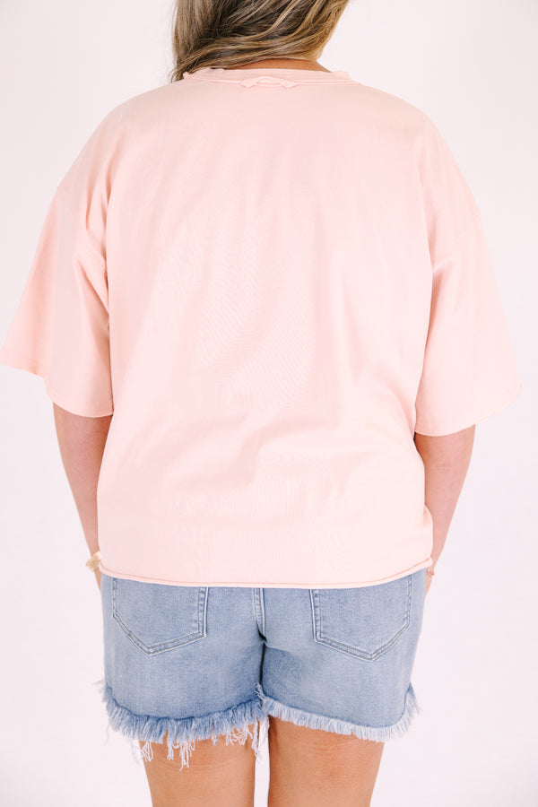Chic Soul plus size clothing, light blush pink short sleeve slightly cropped tee with “Get em tiger” in pink and orange vintage style font and and pink and orange tiger graphic below the text 
