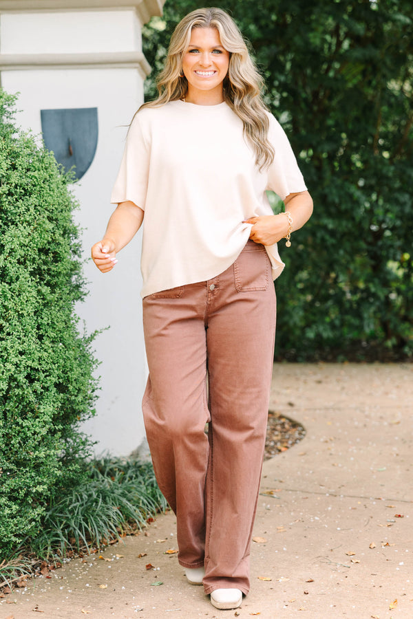 Plus Size wide-leg espresso brown jeans with a button-up fly and front patch pockets.