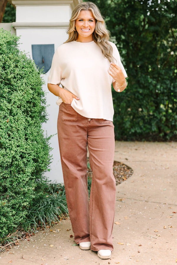 Plus Size wide-leg espresso brown jeans with a button-up fly and front patch pockets.