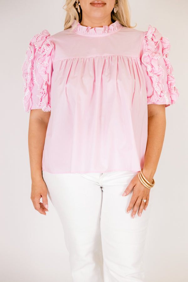 Chic Soul plus size clothing, light pink top with short sleeves that have ruffle detailing throughout the sleeve as well as a small ruffled collar 