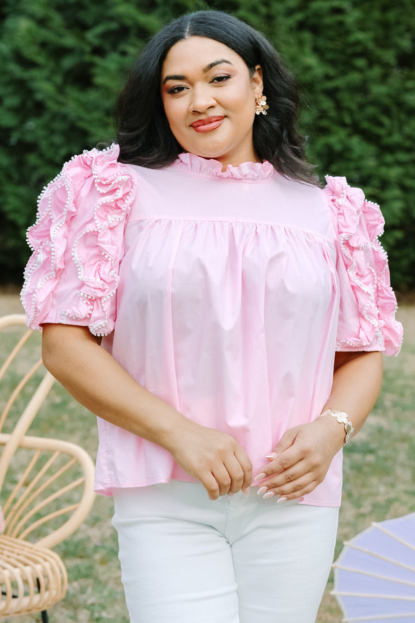 Chic Soul plus size clothing, light pink top with short sleeves that have ruffle detailing throughout the sleeve as well as a small ruffled collar 