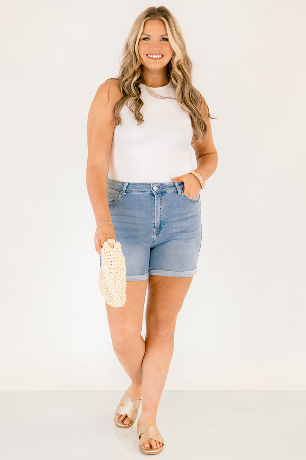 Chic Soul plus size clothing, light wash mid thigh length denim shorts with a rolled cuff hem