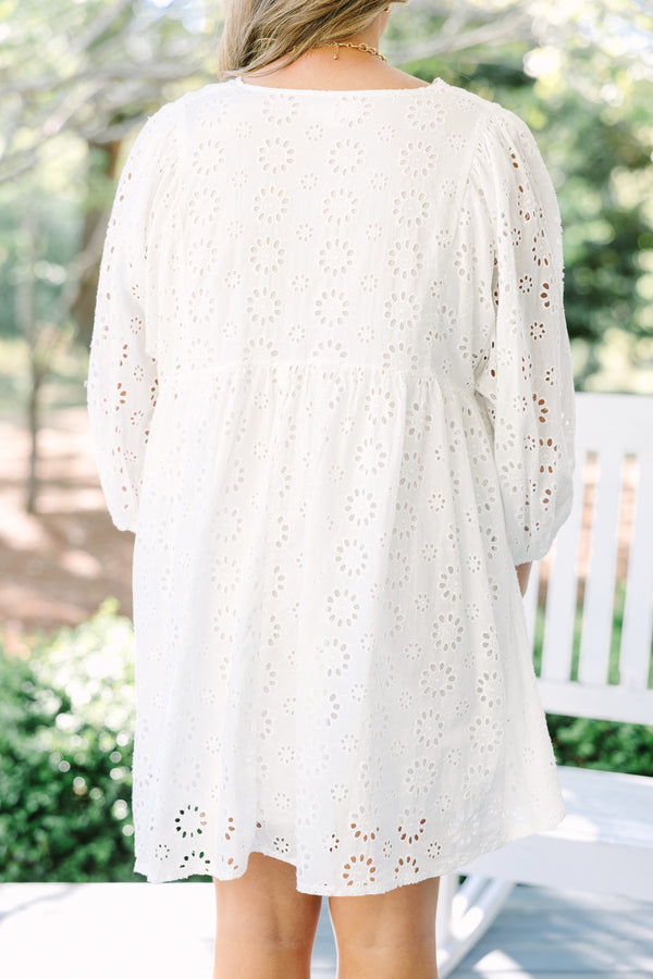 Chic Soul plus size clothing, white eyelet long sleeve babydoll dress with v neckline and tassels hanging from the collar
